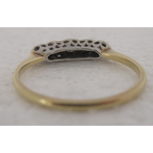 315 - An 18ct gold ring, set with five diamonds 