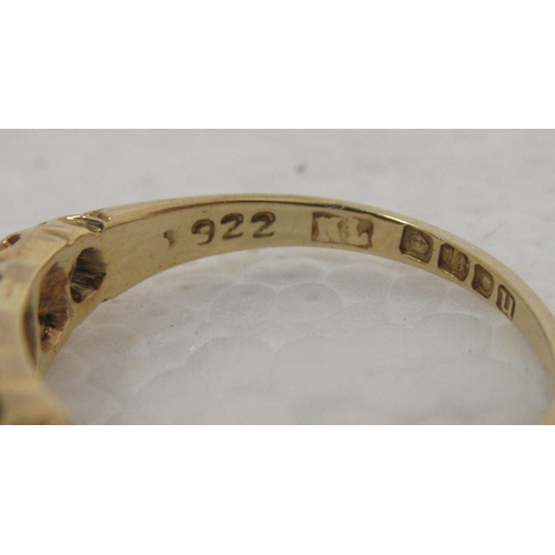 327 - An 18ct gold ring, set with five diamonds 