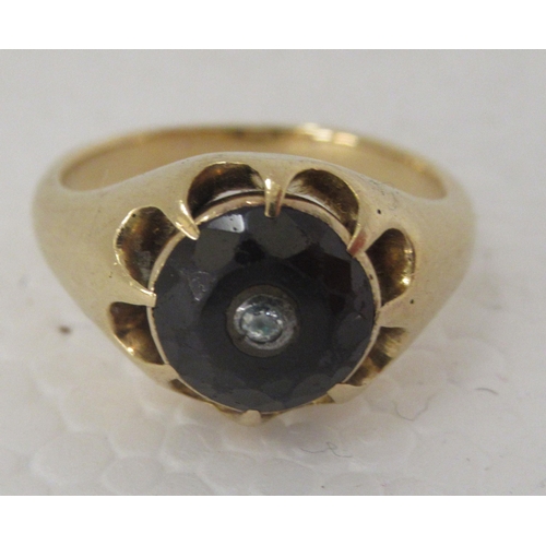 330 - An 18ct gold gypsy ring, set with a garnet 