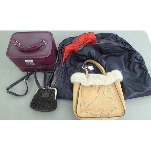 343 - Ladies bags and accessories: to include a Zilli black leather garment carrier 