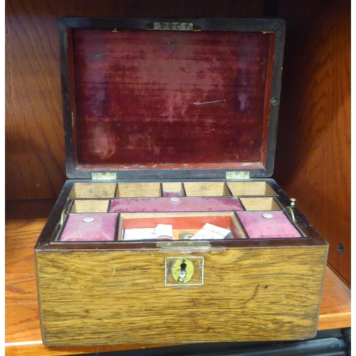 35 - A late Victorian rosewood sewing box with a hinged lid, enclosing a tray fitted interior  6