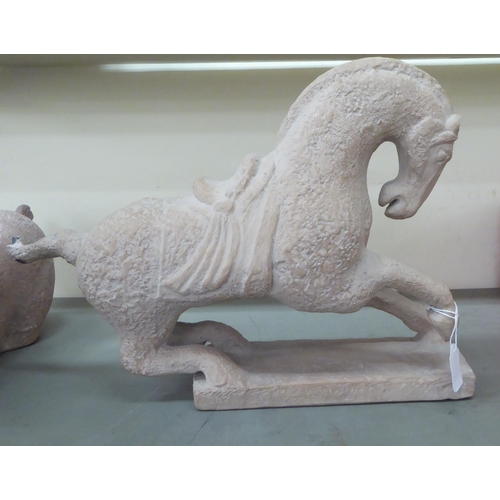 377 - Two pottery model horses  14