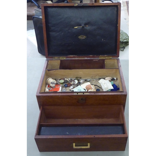 4 - A late Victorian W.Butcher & Co mahogany homeopaths table-top cabinet with a hinged lid and base... 