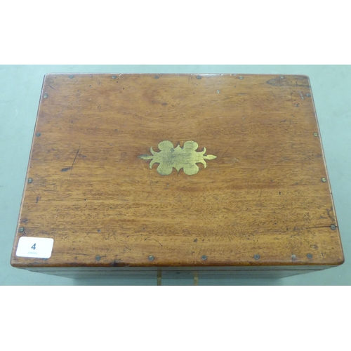 4 - A late Victorian W.Butcher & Co mahogany homeopaths table-top cabinet with a hinged lid and base... 