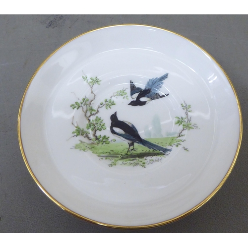 6 - A set of six Royal Crown Derby china Cuthbert Gresley coffee cans and saucers, painted with magpies