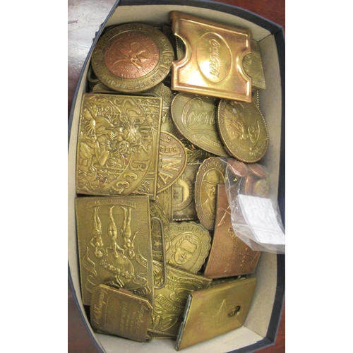 68 - A collection of variously themed, reproductions of American cast brass belt buckles