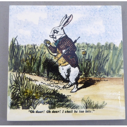 87 - A set of five Alice in Wonderland themed pottery tiles  6