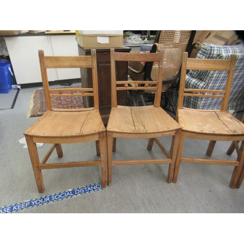 135 - Four early 19thC country made ash and oak framed dining chairs with solid seats, raised on square le... 