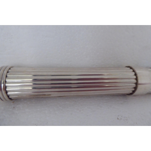 186 - A Christofle plated reeded two part cigar tube