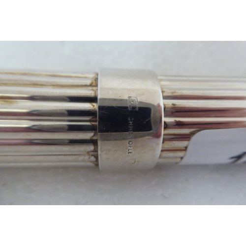 186 - A Christofle plated reeded two part cigar tube