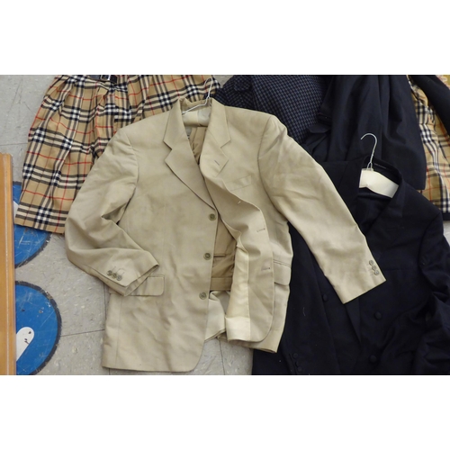 303 - Burberry and similar clothing: to include a three-quarter length raincoat