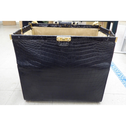 348 - A Dunhill black leather snakeskin effect doctors/Gladstone bag with lacquered brass fittings  12