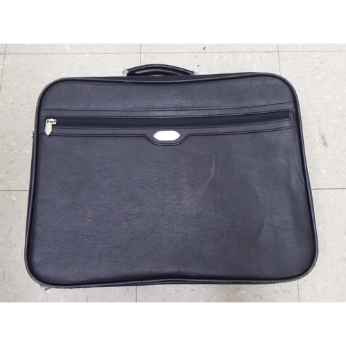 349 - An Asprey black leather executive briefcase with multiple zipped compartments  13