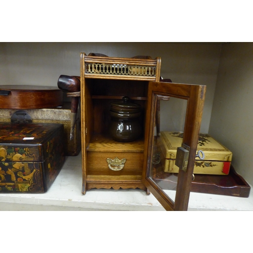 358 - A mixed lot: to include an Edwardian oak smokers cabinet with a glazed door, on a plinth  12