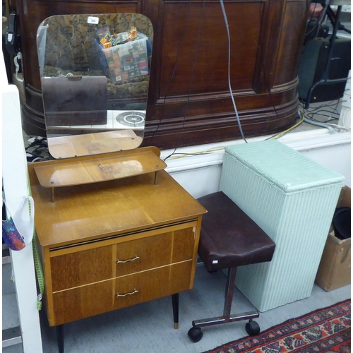 360 - Small furniture: to include a 1960s/70s light oak two drawer dressing table, raised on turned legs  ... 