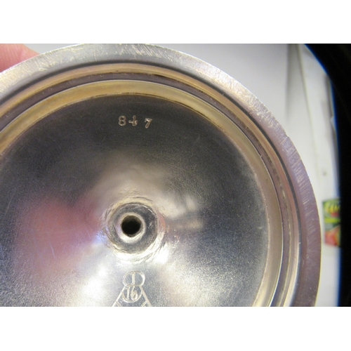 15 - A pair of late 19thC silver Gothic inspired goblets with uniformly engraved decoration, each ovoid s... 