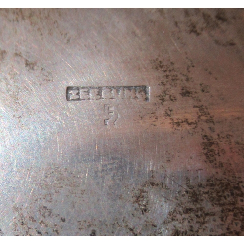 17 - A 1920s Chinese Zee Sung silver engraved sugar basin of cauldron form with a flared rim and swing ha... 
