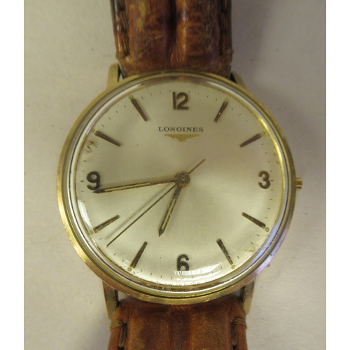 A 1970s Longines gold coloured metal cased wristwatch the