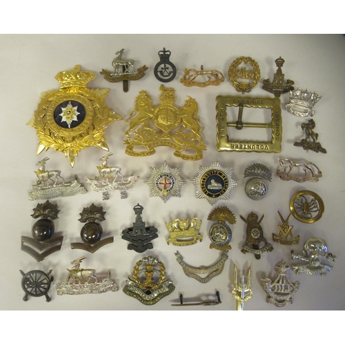 25 - Approx. thirty-two military cap badges and other insignia, some copies: to include the 4th Cheshire ... 