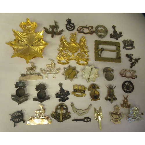 25 - Approx. thirty-two military cap badges and other insignia, some copies: to include the 4th Cheshire ... 