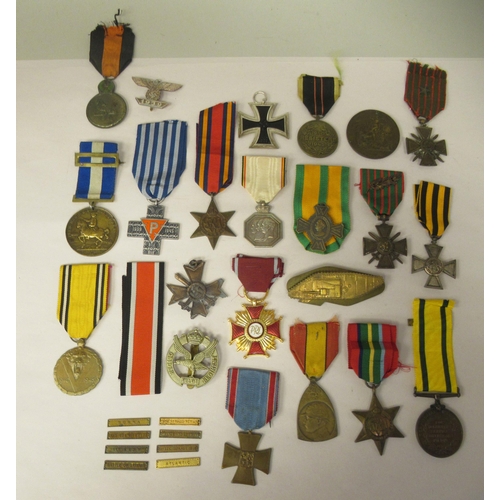 32 - Various 20thC British and foreign medals, medallions and ribbons, some copies: to include a German I... 