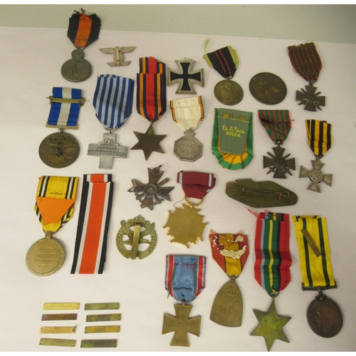 32 - Various 20thC British and foreign medals, medallions and ribbons, some copies: to include a German I... 