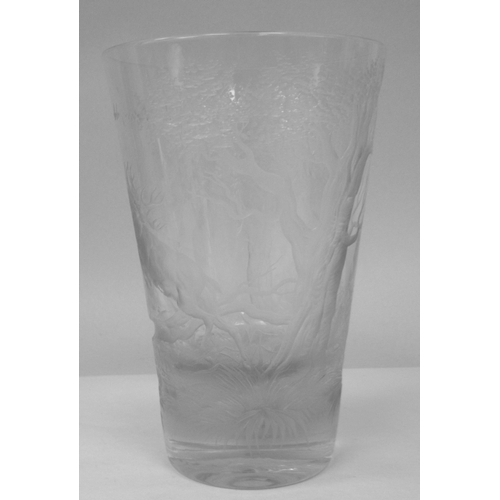 4 - A 19thC Continental glass vase of tapered cylindrical form, engraved with a woodland scene and a lea... 