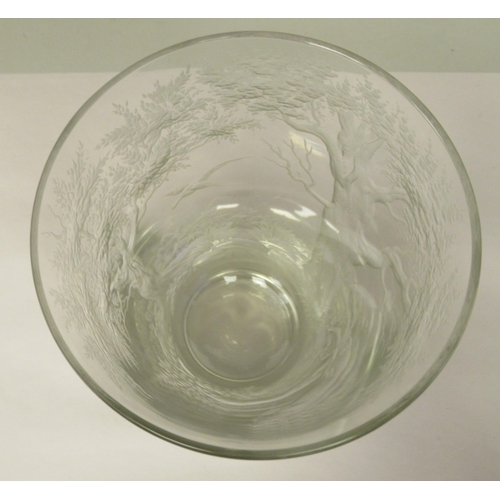4 - A 19thC Continental glass vase of tapered cylindrical form, engraved with a woodland scene and a lea... 