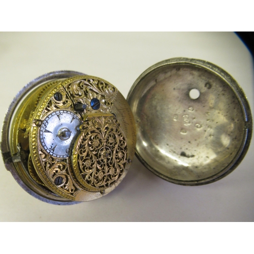 41 - A George III 1792 silver pair cased pocket watch, the movement, No.7935, faced by a white enamel dia... 
