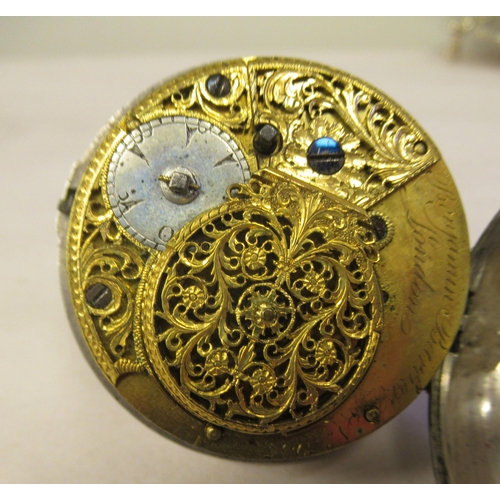 41 - A George III 1792 silver pair cased pocket watch, the movement, No.7935, faced by a white enamel dia... 