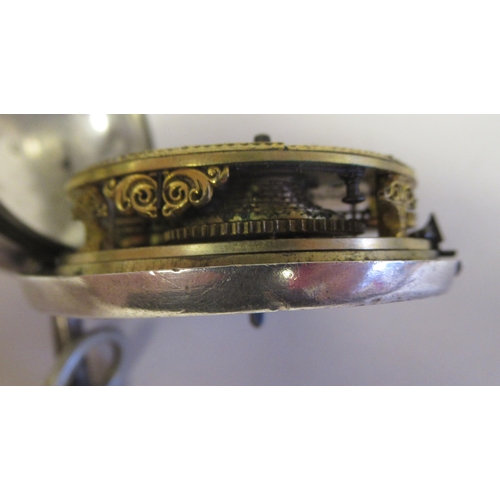 41 - A George III 1792 silver pair cased pocket watch, the movement, No.7935, faced by a white enamel dia... 