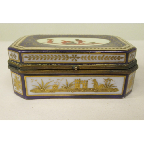 44 - A 19thC Vienna porcelain trinket box of elongated, octagonal form, having a gilt metal collar and hi... 