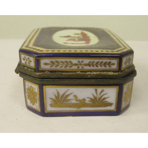 44 - A 19thC Vienna porcelain trinket box of elongated, octagonal form, having a gilt metal collar and hi... 