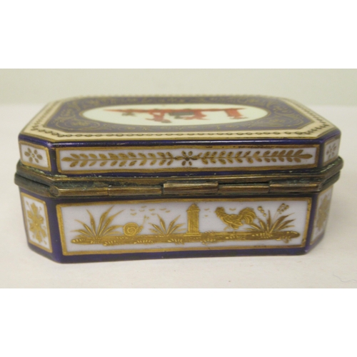 44 - A 19thC Vienna porcelain trinket box of elongated, octagonal form, having a gilt metal collar and hi... 