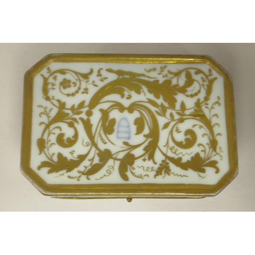 44 - A 19thC Vienna porcelain trinket box of elongated, octagonal form, having a gilt metal collar and hi... 
