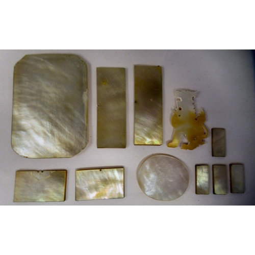 51 - Chinese relief carved mother-of-pearl objects: to include rectangular gaming counters; and an elonga... 