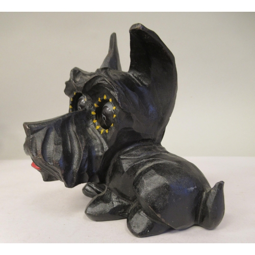 8 - An Art Deco German Oswald Rolling Eye clockwork, novelty timepiece, in a black painted cast iron cas... 