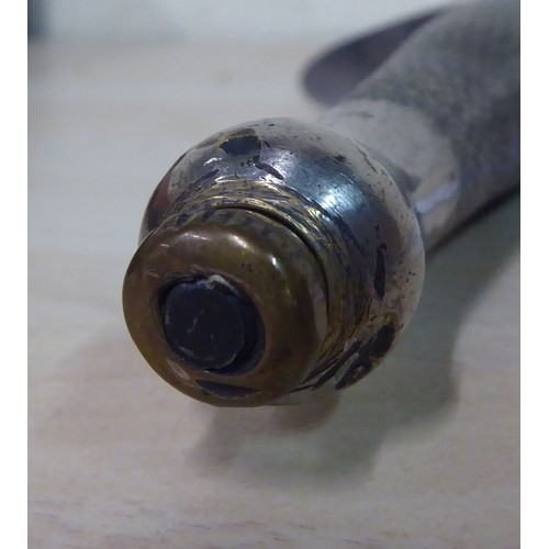 26 - An FS fighting knife with a textured hilt, the Wilkinson blade 6.75