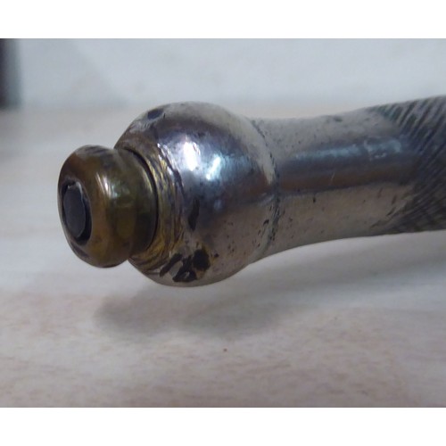 26 - An FS fighting knife with a textured hilt, the Wilkinson blade 6.75