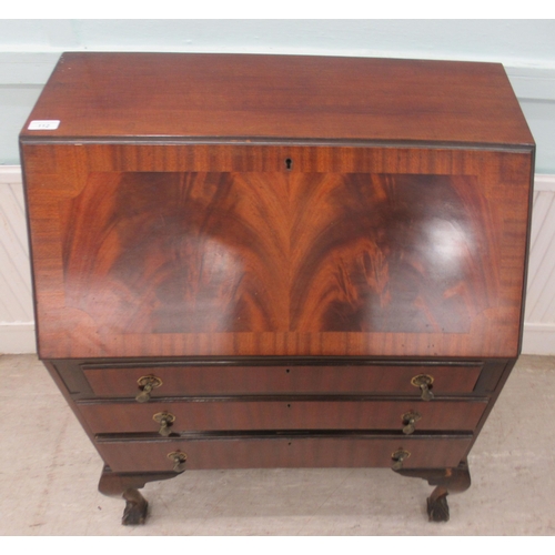 112 - A mid 20thC mahogany finished bureau with a fall front, over three long drawers, raised on cabriole ... 