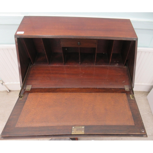 112 - A mid 20thC mahogany finished bureau with a fall front, over three long drawers, raised on cabriole ... 