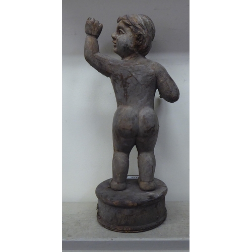 126 - A carved wooden papier mache cherub mould  19