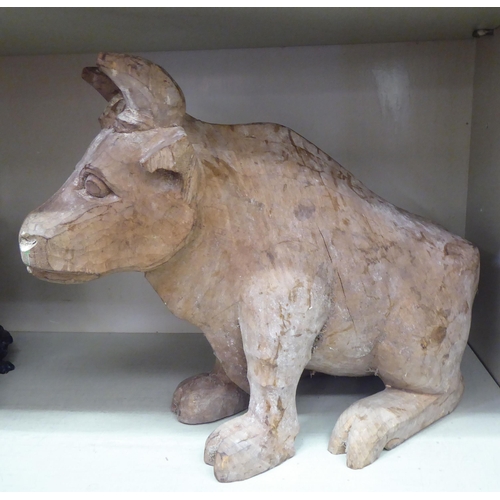 127 - A carved wooden papier mache cow mould  13.5