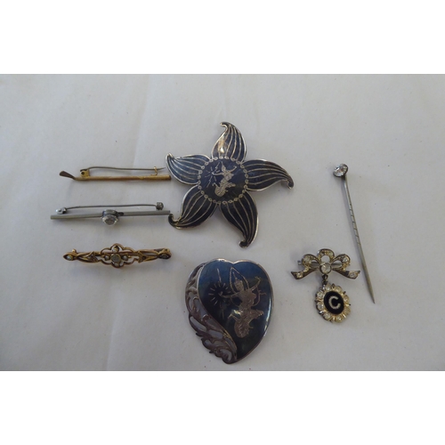 132 - Items of personal ornament: to include two Thai Sterling silver brooches