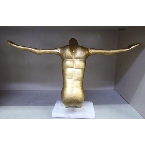 158 - A gilded metal sculpture, a man kneeling with outstretched arms  13