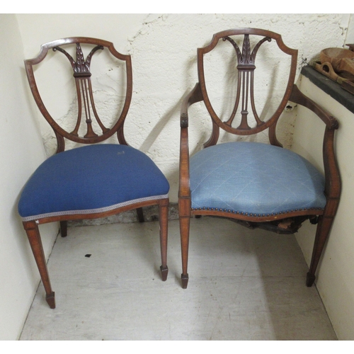 160 - An Edwardian Sheraton style carved and inlaid mahogany framed dining chair with a pierced, shield sh... 