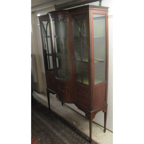 19 - An Edwardian satinwood inlaid mahogany display cabinet with a central bow front panel, flanked by tw... 