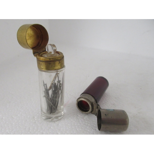 199 - A mixed lot: to include a late Victorian ruby glass scent bottle with a white metal, hinged cap ... 