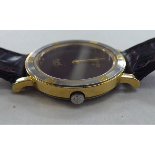 207 - A lady's gold plated, stainless steel cased Hermes of Paris wristwatch, the quartz movement faced by... 