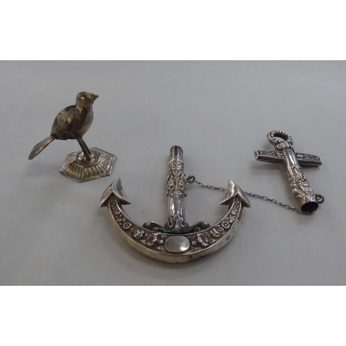 215 - Silver, white metal and other collectables: to include a two-part anchor pendant